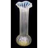 An Walsh Walsh English straw opal glass vase, of cylindrical form with wavy upper rim and bulbous