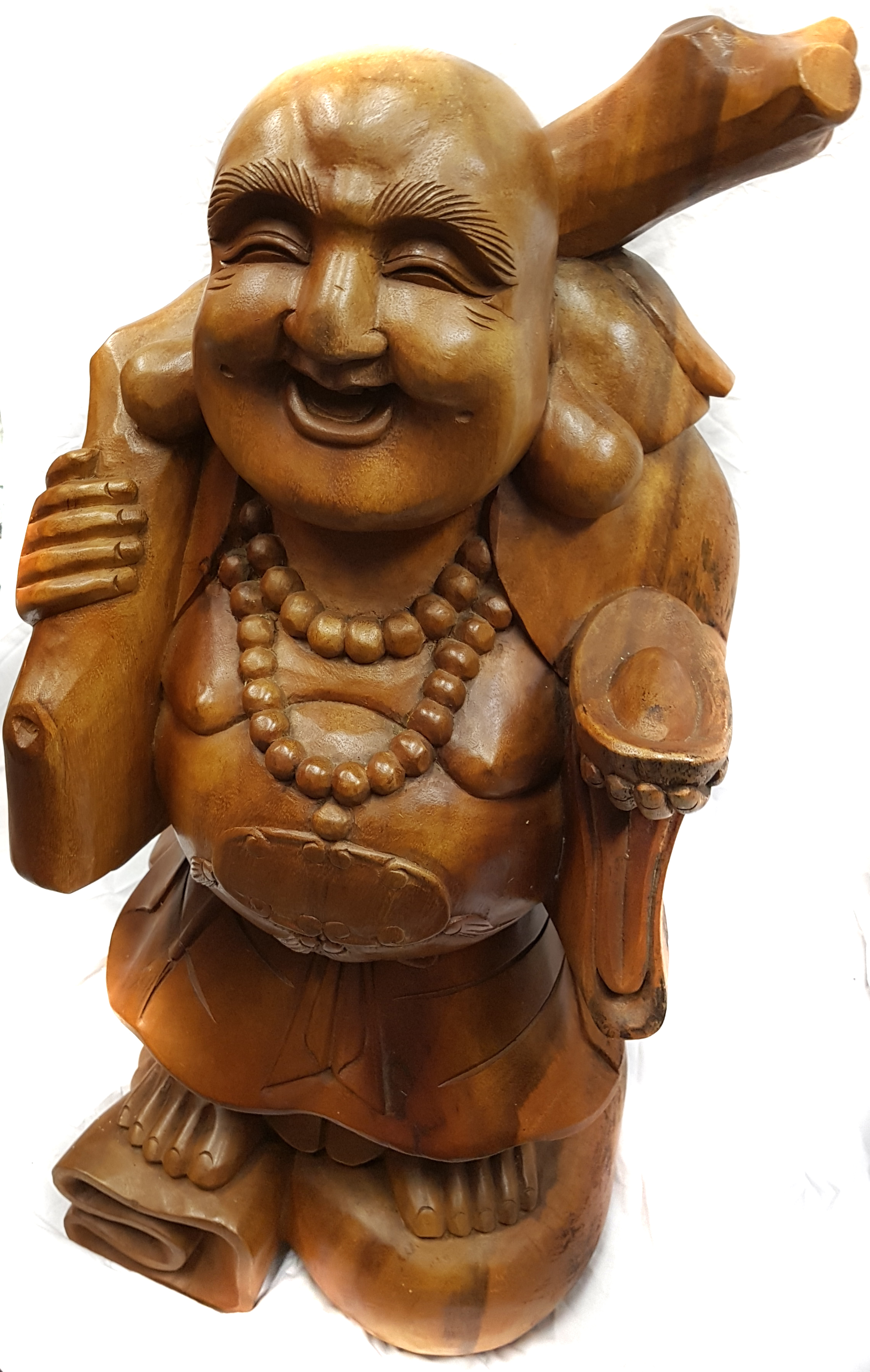 A large Chinese carved wood figure of the laughing buddha, holding staff and syche, 77cm high