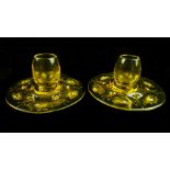 A pair of Webbs Gay glass dwarf candlesticks, yellow amber colour, the circular foot moulded and cut