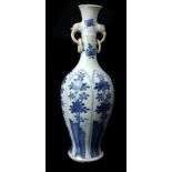 A Chinese blue and white porcelain two handled ring neck bottle vase, the slender neck applied