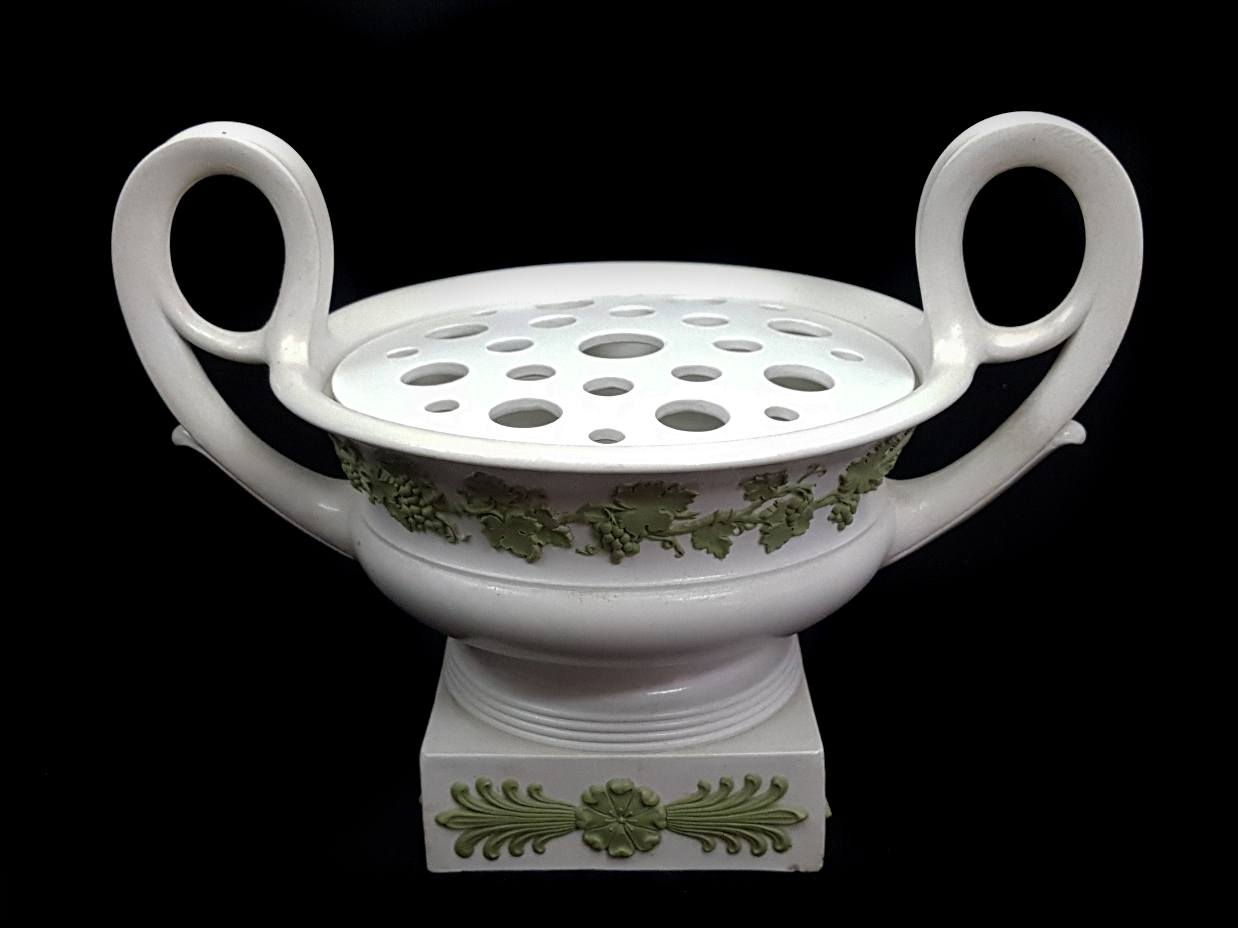 A Wedgwood white smear glaze crater urn and cover, early 19thC, high loop scroll handles, sprigged