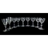 Seven Stourbridge cut glass wine glasses, honeycomb cut bowls on faceted baluster stems, 12.5cm high