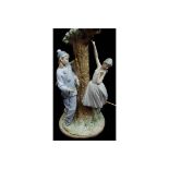 LLadro Porcelain - a rare Pierrot and Ballerina figural lampbase, the figures posed around a leafy