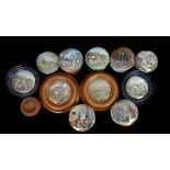 A group of Prattware pottery pot lids, printed in colours with various subjects including