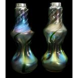 A pair of Bohemian silver mounted iridescent double gourd glass vases, spiral striped in emerald