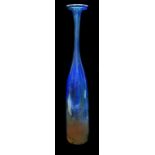 Michael Harris for Isle of Wight Glass - a tall blue aurene attenuated bottle vase, 46cm high