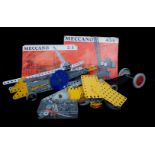 A small quantity of Meccano; and two instruction booklets for Meccano sets 2/3 and 4/5/6 (qty)