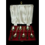 A cased set of silver coffee spoons, Sheffield 1938, makers mark EV