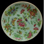 A Chinese celedon ground famile rose, decorated plate, blue printed seal mark, 18cm diam