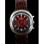 A Breitling Geneve Datora mens chronograph wristwatch, black and red multi dial face, with date