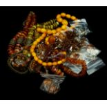 Costume Jewellery - Various items of faux amber jewellery including an antique style bead