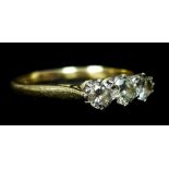 An 18ct yellow gold, three stone diamond ring, ring size Q