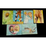 Six French 'cheeky' postcards, various parts of nude female bodies with cartoon editions, in