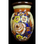 A Boch Frere Keramis vase, ovoid with flared neck, decorated with Art Deco flowers in tones of