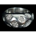 A 950 Platinum diamond set dome ring ring by Faraone, ten clusters of diamonds pave set, marked PT