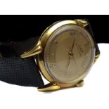 A gentleman's Paul Picot Geneve wristwatch, white dial with gilt hour batons, Roman numerals at