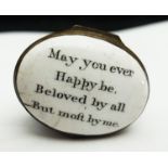 A Bilston enamel oval patch box, the hinged cover with verse, 'May you ever Happy be. Beloved by all