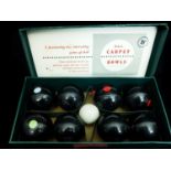 A set of indoor carpet bowls, manufactured by Brookes & Adams Limited, boxed