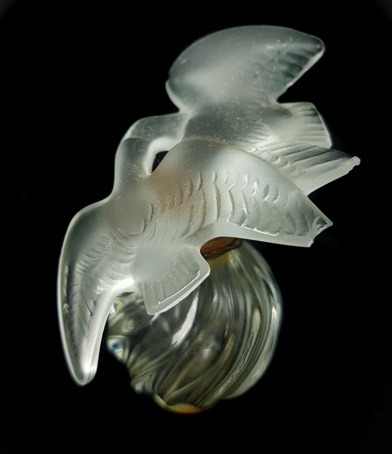 L'Air du Temps -Nina Ricci- A Lalique Glass bottle, of small size, spiral fluted ovoid body with - Image 3 of 4