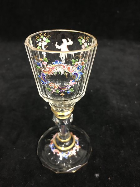 A Lobmeyr liqueur glass, delicately enamelled with an 18th Century man with bottle and glass - Image 2 of 3