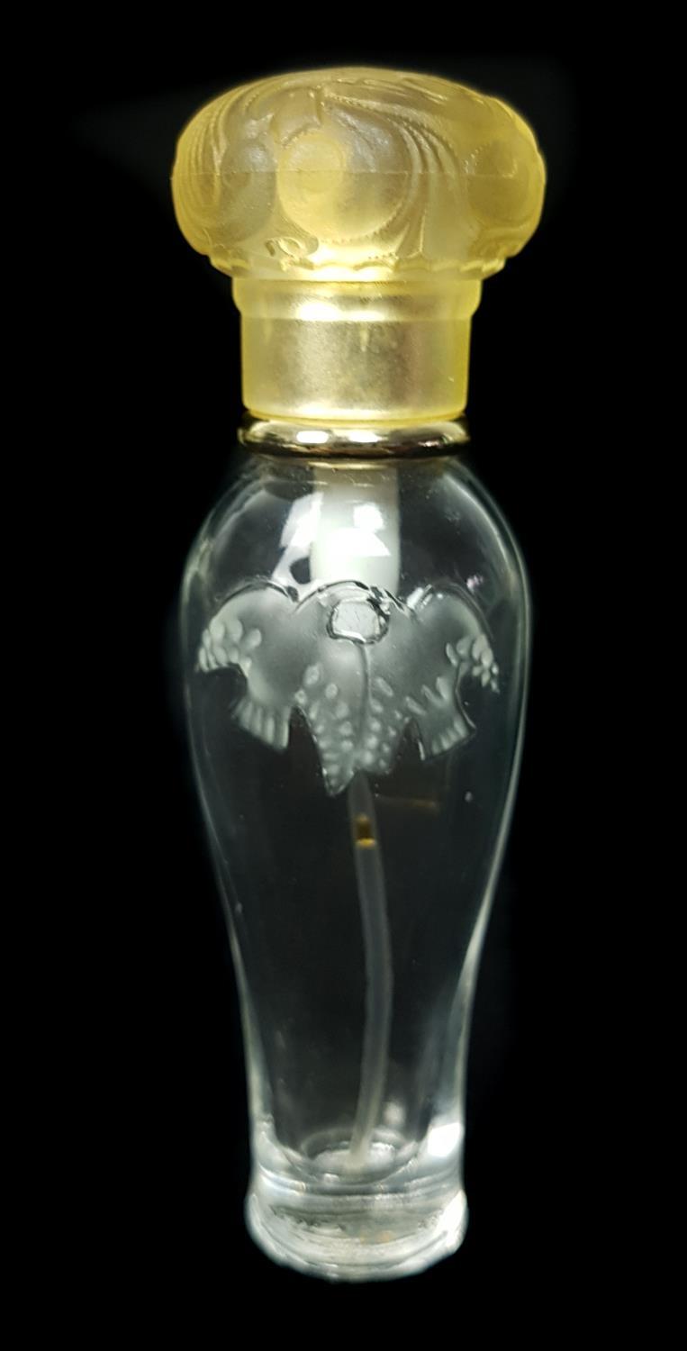 L'Air du Temps -Nina Ricci- A Lalique Glass bottle, of small size, spiral fluted ovoid body with - Image 4 of 4