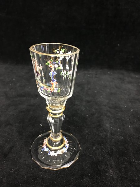 A Lobmeyr liqueur glass, delicately enamelled with an 18th Century man with bottle and glass - Image 3 of 3