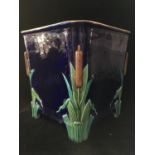 A Minton Majolica bullrush pattern jardiniere, of square section with a single stem bullrush to each