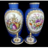 A large pair of Dresden porcelain vases and covers, decorated in the manner of Meissen porcelain