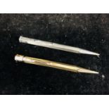 Two Yard O Led propelling pencils, one rolled gold, the other silver, both Patent Number 422767 (2)