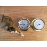 A brass finish barometer and clock set; and a ships bell (3)