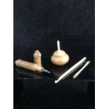 Sewing requisites - A carved boxwood bodkin case, with sewing needles; a bone crochet hook; a bone