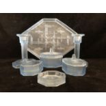 An art deco frosted blue pressed glass dressing table set, each piece of octagonal section; a
