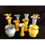 Tango Glass - Twelve vases and bowls, each with frilled rim trailed in black, of yellow and sky blue