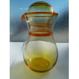 An Art glass carafe and tumbler set, of amber body with tangerine trailing, 21.5cm max (2)