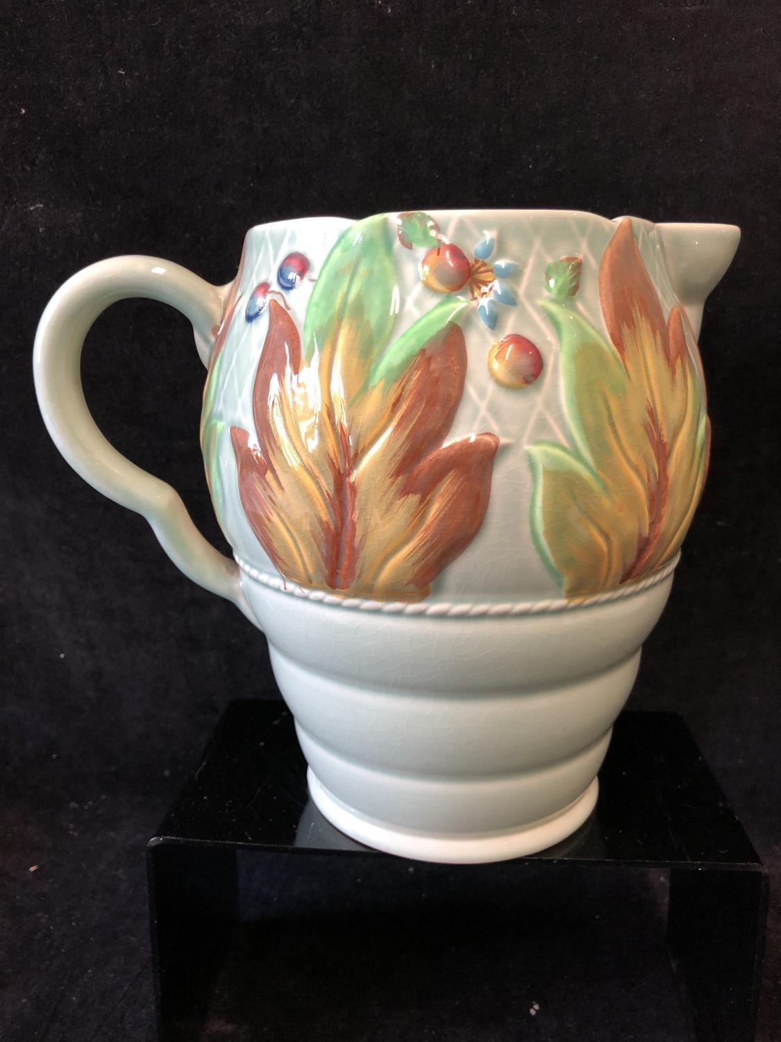 A Clarice Cliff pottery Jug, in Celtic leaf and berry pattern, jade green ground with leaves and - Image 3 of 6
