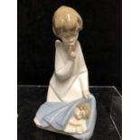 A Lladro porcelain figure, Guardian Angel with baby, No 4635, designed by Juan Huerta, issued