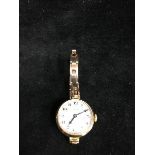 A 9ct J W Benson, London wrist watch, 1920's, circular dial, arabic numerals, gross weight, 24.5
