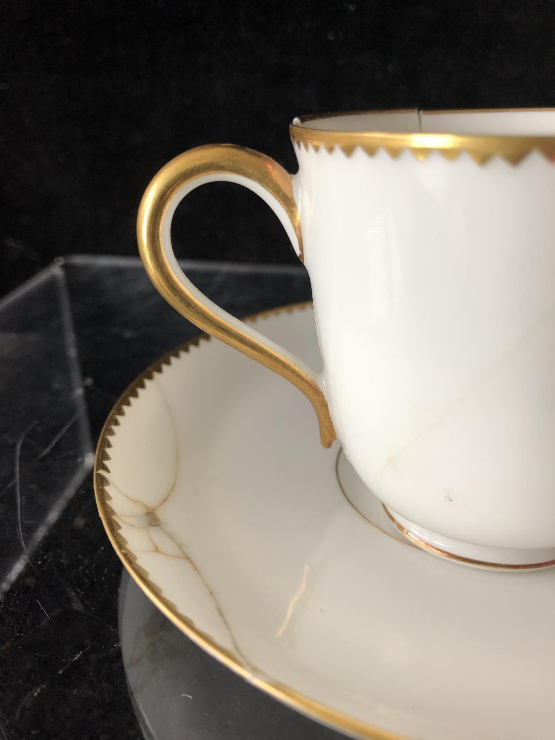 A Minton coffee cup and saucer, enamelled with cyclamen flower heads interspersed with cyclamen - Image 7 of 19