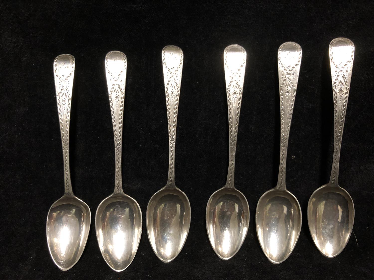 Six silver bright cut decorated tea spoons, London 1790, makers mark of TW (6)