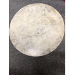 A variegated grey/white marble circular table top, 47cm diam