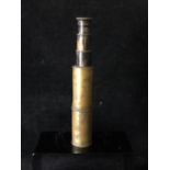 An Edward Petitpierre, Berlin, four draw telescope, black with brass external case, the eye piece