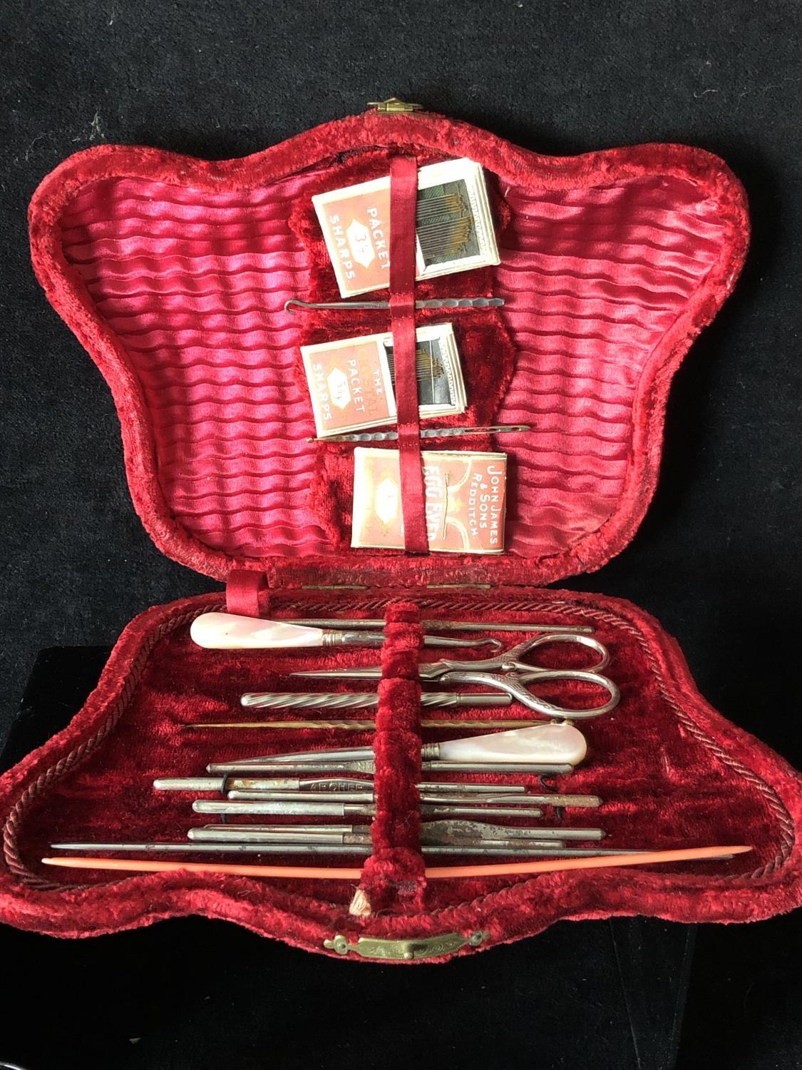 A Velvet butterfly form work case, containing various sewing requisites, scissors, needles, button - Image 3 of 7
