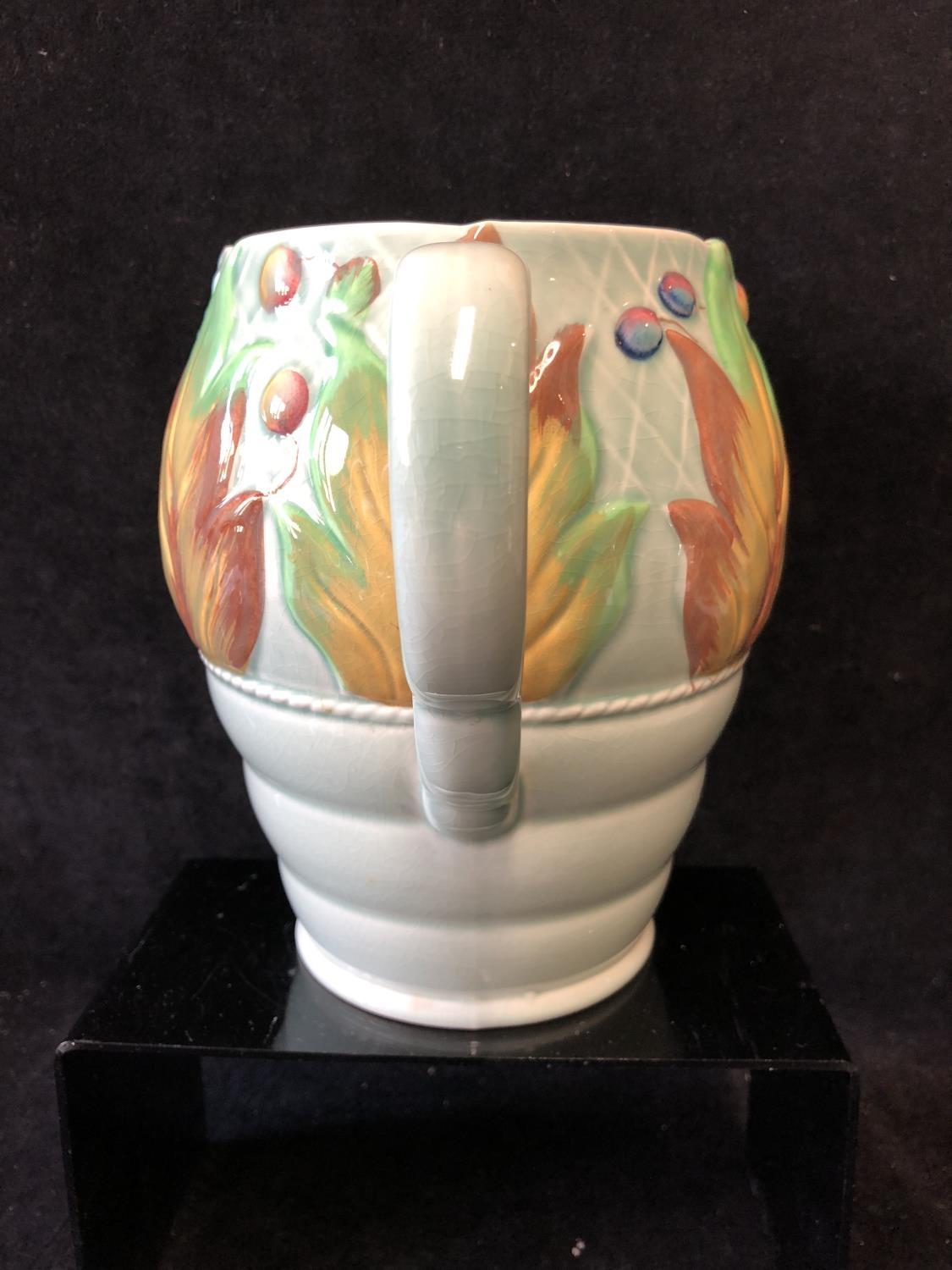 A Clarice Cliff pottery Jug, in Celtic leaf and berry pattern, jade green ground with leaves and - Image 2 of 6