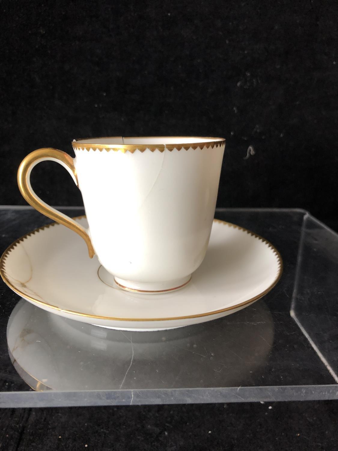 A Minton coffee cup and saucer, enamelled with cyclamen flower heads interspersed with cyclamen - Image 5 of 19