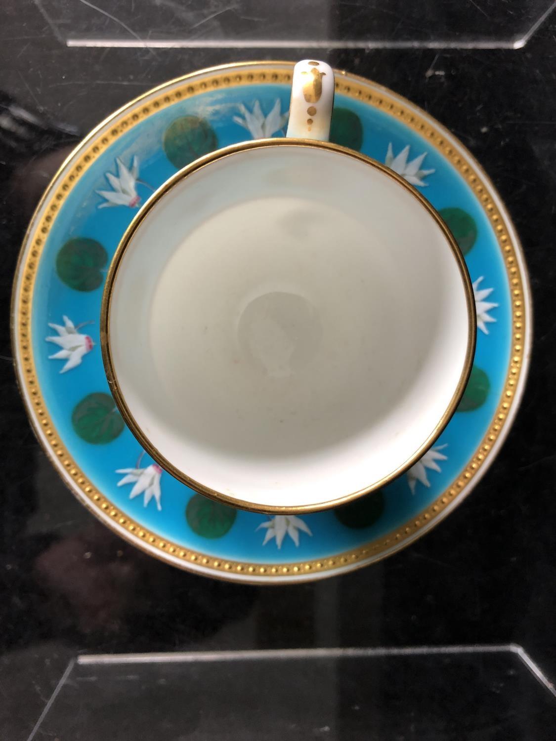 A Minton coffee cup and saucer, enamelled with cyclamen flower heads interspersed with cyclamen - Image 12 of 19