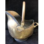 A brass helmet form coal scuttle, 44cm high approx