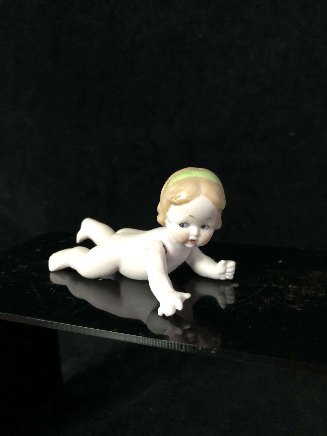 A bisque porcelain Character Child doll figure, probably Heubach Germany, modelled naked and - Image 2 of 4
