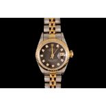 A LADIES BI COLOUR ROLEX WRIST WATCH, with black face and diamond numbers,