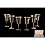 A MODERN IRISH SILVER SET OF SIX WINE GOBLETS, with gilded interiors, by George Bellew,