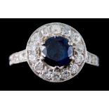 A SAPPHIRE AND DIAMOND RING, with sapphire of approx. 1ct, diamonds of approx. 0.